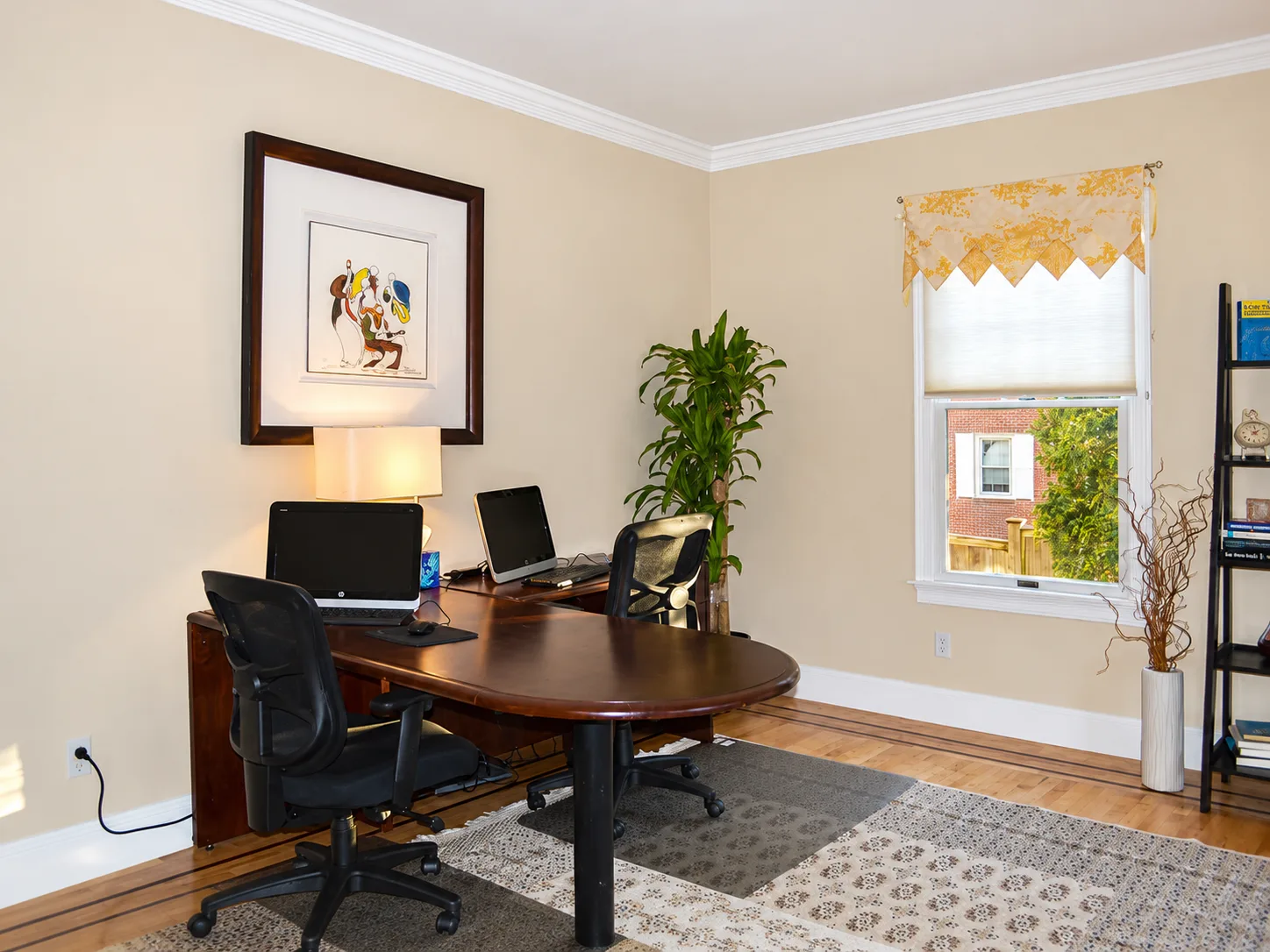 Client office with computers at Tharros House