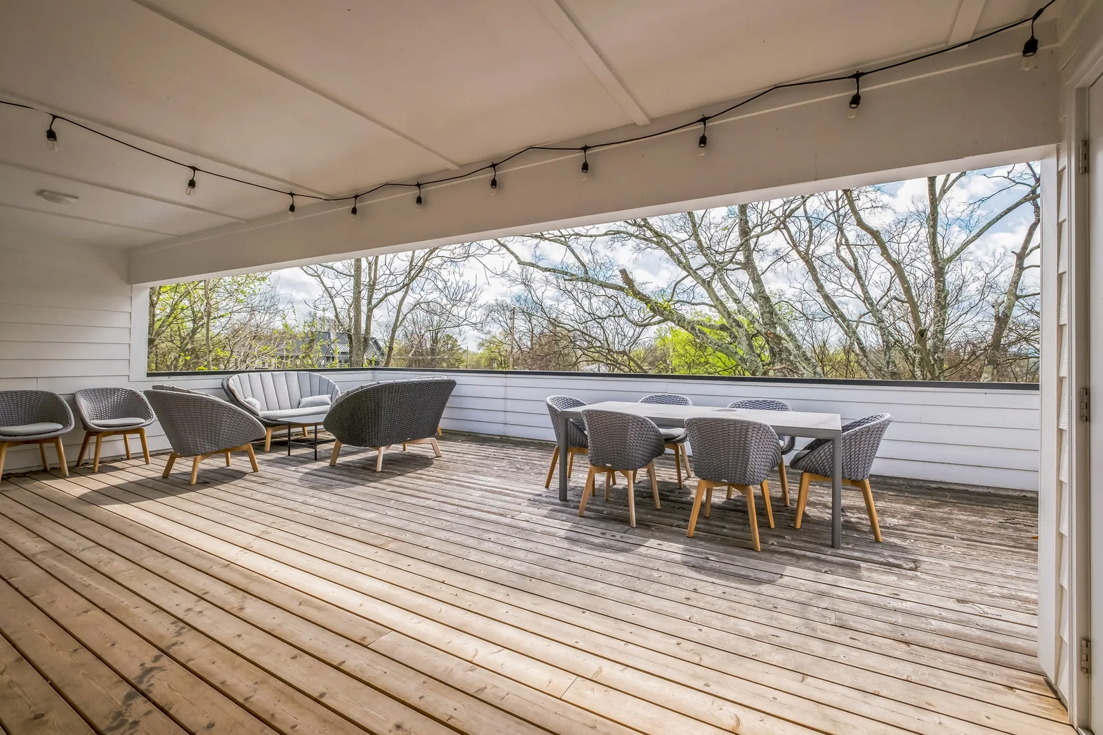 The covered upper deck lounge at Tharros House Nashville