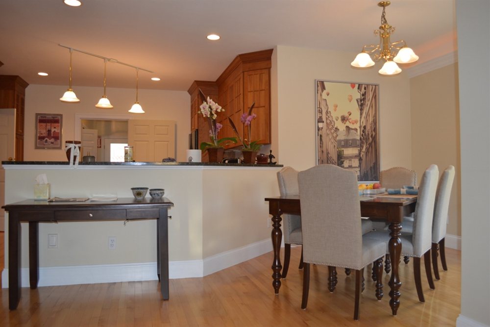 The open kitchen and dining area where residents share meals at Tharros House.